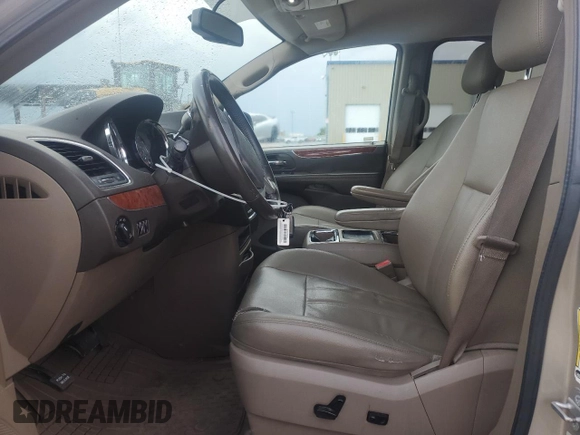 2015 Chrysler Town & Country Touring with VIN 2C4RC1BG2FR711051, listed as a Copart auction lot 54198195 with 191,545 mi miles and Salvage Title. Bid and sale history available at DreamBid. Image 7.