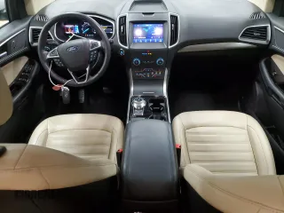 2020 Ford Edge SEL z VIN 2FMPK4J90LBB13748, wystawiony jako Copart lot #65687415 z przebiegiem 108 629 mil mil oraz Czysty tytuł • Clean title. Historia ofert i sprzedaży dostępna na DreamBid. Obrazek 8.