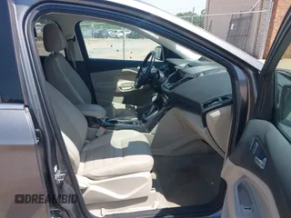 2014 Ford Escape Titanium z VIN 1FMCU0JX3EUA26519, wystawiony jako IAAI lot #42553081 z przebiegiem 108 052 mil mil oraz . Historia ofert i sprzedaży dostępna na DreamBid. Obrazek 5.