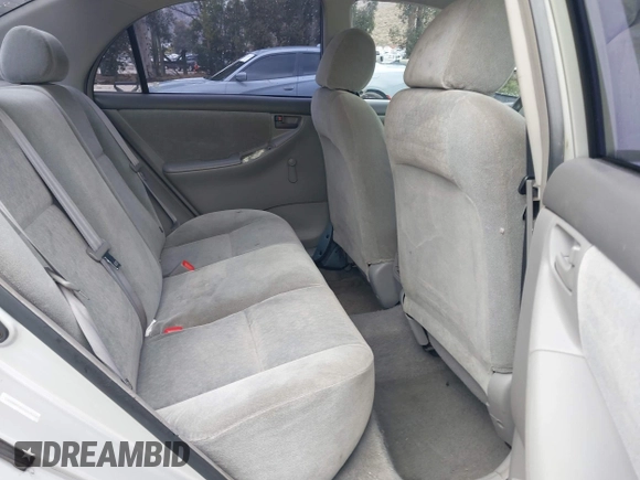 2004 Toyota Corolla CE with VIN 1NXBR32E24Z275615, listed as a IAAI auction lot 42180665 with 210,598 mi miles and . Bid and sale history available at DreamBid. Image 8.