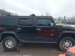 2003 Hummer H2 with VIN 5GRGN23UX3H106356, listed as a IAAI auction lot 41185603 with Not Provided miles. Bid and sale history available at carsss.com. Image 13.