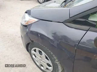2013 Ford Fiesta S z VIN 3FADP4AJ9DM175576, wystawiony jako IAAI lot #42449969 z przebiegiem 123 959 mil mil oraz . Historia ofert i sprzedaży dostępna na DreamBid. Obrazek 13.