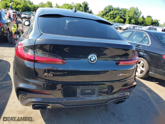2021 BMW X4 M40i with VIN 5UX2V5C0XM9G31201, listed as a Copart auction lot 60274654 with 0 mi miles and Salvage Title. Bid and sale history available at carsss.com. Image 6.