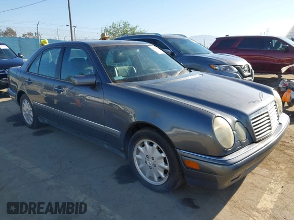 1997 Mercedes-Benz E 320 with VIN WDBJF55F7VA402305, listed as a IAAI auction lot 41865470 with 210,577 mi miles and . Bid and sale history available at DreamBid. Image 1.
