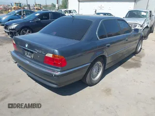 2000 BMW 7 Series 740iL with VIN WBAGH8348YDP14383, listed as a IAAI auction lot 42623041 with 176,801 mi miles and . Bid and sale history available at DreamBid. Image 4.
