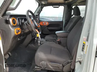 2023 Jeep Wrangler Willys with VIN 1C4HJXDN6PW664826, listed as a Copart auction lot 54842415 with 20,004 mi miles and Salvage Title. Bid and sale history available at DreamBid. Image 7.