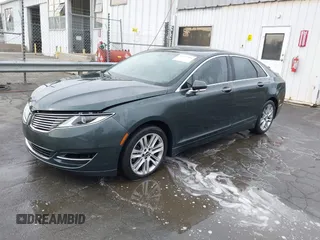 2015 Lincoln MKZ z VIN 3LN6L2J99FR605715, wystawiony jako IAAI lot #41431384 z przebiegiem Nie podano mil oraz . Historia ofert i sprzedaży dostępna na DreamBid. Obrazek 2.