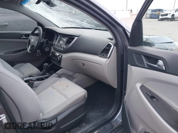 2016 Hyundai Tucson Sport with VIN KM8J33A26GU189300, listed as a IAAI auction lot 41372422 with 94,848 mi miles. Bid and sale history available at carsss.com. Image 5.