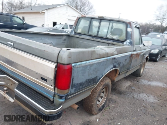 1990 Ford F-150 "S" with VIN 1FTDF15Y4LNB46798, listed as a IAAI auction lot 41767651 with 578,470 mi miles. Bid and sale history available at carsss.com. Image 4.