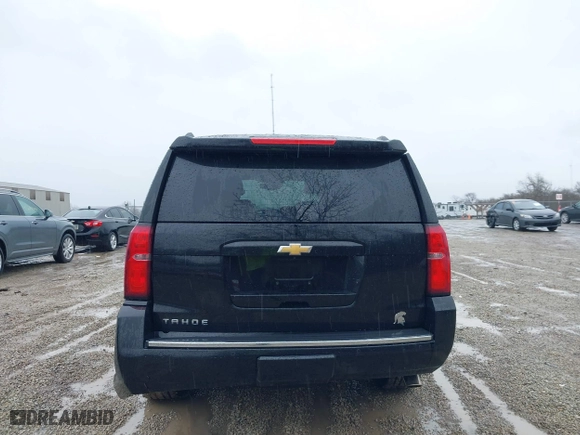 2016 Chevrolet Tahoe LTZ with VIN 1GNSKCKC2GR104305, listed as a IAAI auction lot 41697868 with 124,670 mi miles. Bid and sale history available at carsss.com. Image 16.