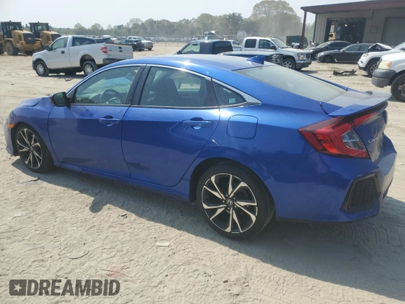 2019 Honda Civic Si with VIN 2HGFC1E52KH702946, listed as a Copart auction lot 53939675 with 64,623 mi miles and Salvage Title. Bid and sale history available at DreamBid. Image 2.