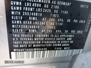 2012 Volkswagen Tiguan LE z VIN WVGAV7AX6CW594438, wystawiony jako Copart lot #42971665 z przebiegiem 120 532 mil mil oraz Szkoda całkowita • Salvage title. Historia ofert i sprzedaży dostępna na DreamBid. Obrazek 13.