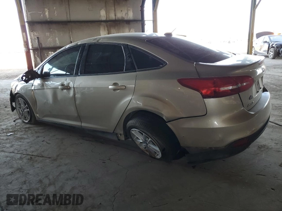 2017 Ford Focus SE with VIN 1FADP3F27HL303378, listed as a Copart auction lot 51862925 with 98,464 mi miles and Salvage Title. Bid and sale history available at DreamBid. Image 2.