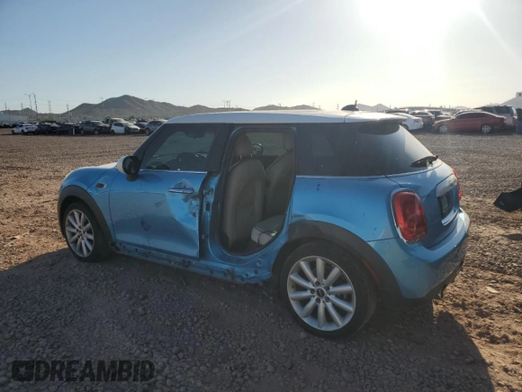 2015 MINI Hardtop 4 Door with VIN WMWXS5C54FT827341, listed as a Copart auction lot 63872395 with 83,023 mi miles and Salvage title. Bid and sale history available at DreamBid. Image 2.