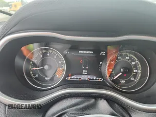 2014 Jeep Cherokee Trailhawk с VIN 1C4PJMBS1EW212024, выставлен на аукционе Copart как лот 58825265 с пробегом 99 087 миль миль и Списание • Salvage title. История ставок и продаж доступна на DreamBid. Изображение 9.