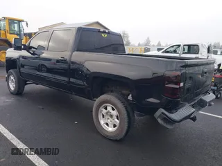 2017 Chevrolet Silverado 1500 LT with VIN 1GCUKREC1HF117744, listed as a IAAI auction lot 41091255 with 61,984 mi miles and . Bid and sale history available at DreamBid. Image 3.