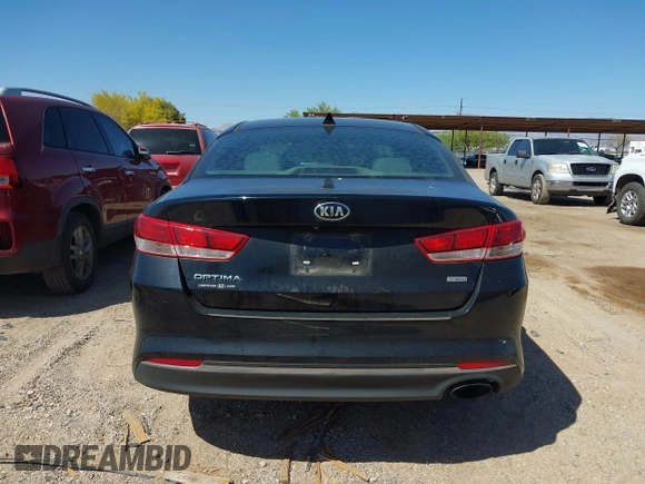 2016 Kia Optima LX Turbo with VIN 5XXGT4L12GG002889, listed as a IAAI auction lot 41989834 with 107,421 mi miles. Bid and sale history available at carsss.com. Image 16.