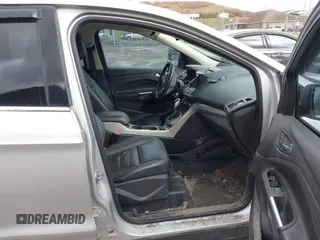 2013 Ford Escape SEL with VIN 1FMCU9H93DUA81448, listed as a IAAI auction lot 41790631 with 176,015 mi miles. Bid and sale history available at carsss.com. Image 5.