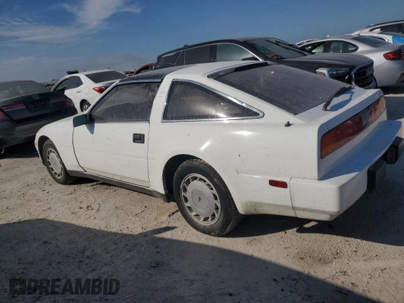 1988 Nissan 300ZX GS z VIN JN1HZ16S6JX204756, wystawiony jako Copart lot #75877174 z przebiegiem Nie podano mil oraz Szkody całkowita. Historia ofert i sprzedaży dostępna na DreamBid. Obrazek 2.