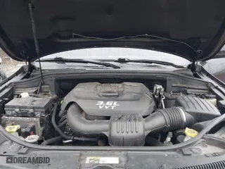 2014 Jeep Grand Cherokee Laredo with VIN 1C4RJFAG7EC179243, listed as a IAAI auction lot 41453738 with 182,000 mi miles. Bid and sale history available at carsss.com. Image 10.