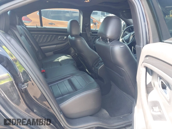 2013 Ford Taurus SHO z VIN 1FAHP2KT1DG135962, wystawiony jako IAAI lot #42449604 z przebiegiem 138 921 mil mil oraz . Historia ofert i sprzedaży dostępna na DreamBid. Obrazek 8.