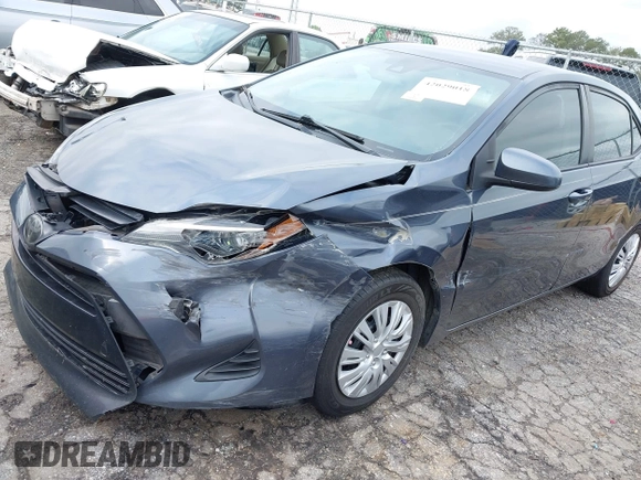 2019 Toyota Corolla L with VIN 5YFBURHE8KP936426, listed as a IAAI auction lot 42029018 with 190,163 mi miles and . Bid and sale history available at DreamBid. Image 2.