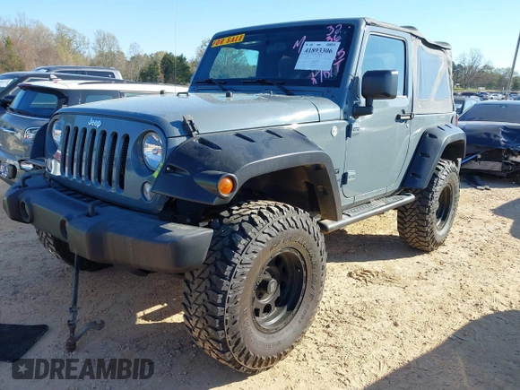 2015 Jeep Wrangler Sport with VIN 1C4AJWAG0FL591213, listed as a IAAI auction lot 41893306 with 107,807 mi miles and . Bid and sale history available at DreamBid. Image 17.