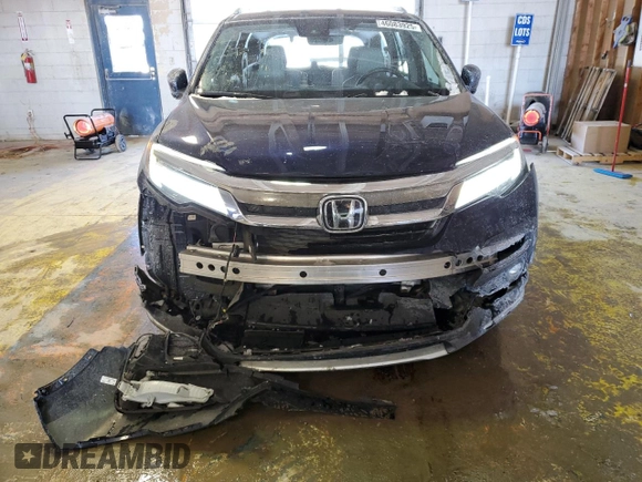 2020 Honda Pilot Touring 7-Passenger z VIN 5FNYF6H67LB031880, wystawiony jako Copart lot #46083925 z przebiegiem 59 729 mil mil oraz Szkoda całkowita • Salvage title. Historia ofert i sprzedaży dostępna na DreamBid. Obrazek 5.