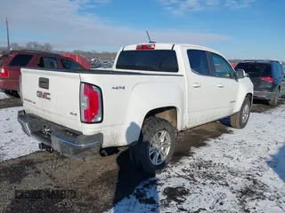 2019 GMC Canyon 4WD SLE with VIN 1GTG6CEN1K1301425, listed as a IAAI auction lot 41358278 with 105,106 mi miles. Bid and sale history available at carsss.com. Image 4.