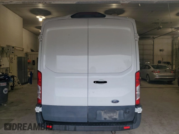 2019 Ford Transit with VIN 1FTYE2CM7KKB51357, listed as a Copart auction lot 52594215 with 94,789 mi miles and Salvage title. Bid and sale history available at DreamBid. Image 6.