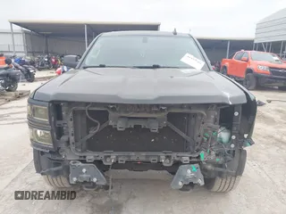 2015 Chevrolet Silverado 1500 LT with VIN 3GCPCREC0FG412551, listed as a IAAI auction lot 41577706 with 156,318 mi miles and . Bid and sale history available at DreamBid. Image 13.