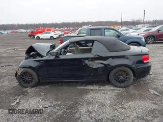 2011 BMW 1 Series 128i with VIN WBAUN1C5XBVH82457, listed as a IAAI auction lot 41173785 with Not provided miles and . Bid and sale history available at DreamBid. Image 14.