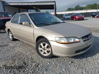 2000 Honda Accord SE z VIN 1HGCG6698YA107838, wystawiony jako IAAI lot #42468200 z przebiegiem 215 494 mil mil oraz . Historia ofert i sprzedaży dostępna na DreamBid. Obrazek 1.