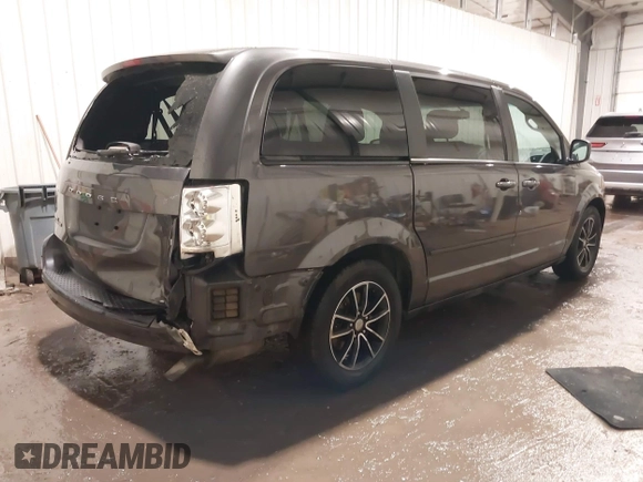 2016 Dodge Grand Caravan SE with VIN 2C4RDGBGXGR219689, listed as a IAAI auction lot 41675960 with 112,045 mi miles and . Bid and sale history available at DreamBid. Image 4.