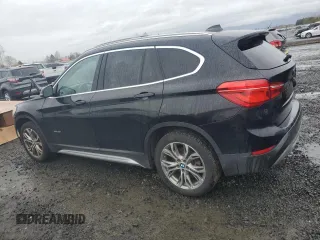 2016 BMW X1 xDrive28i with VIN WBXHT3Z30G4A49460, listed as a Copart auction lot 48998755 with 117,525 mi miles and Salvage Title. Bid and sale history available at carsss.com. Image 2.