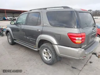 2004 Toyota Sequoia SR5 with VIN 5TDZT34A84S217320, listed as a IAAI auction lot 41472557 with 299,000 mi miles. Bid and sale history available at carsss.com. Image 3.