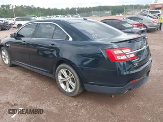 2014 Ford Taurus SEL with VIN 1FAHP2E83EG125068, listed as a IAAI auction lot 42101295 with 244,063 mi miles. Bid and sale history available at carsss.com. Image 3.