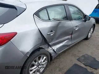 2015 Mazda 3 i Touring with VIN JM1BM1L73F1245180, listed as a IAAI auction lot 41723726 with 139,321 mi miles and . Bid and sale history available at carsss.com. Image 6.