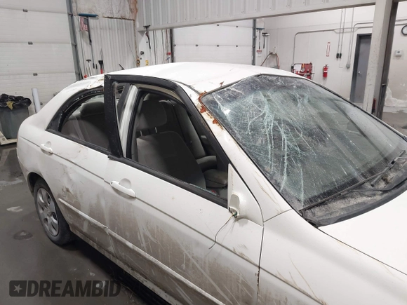 2008 Kia Spectra SX with VIN KNAFE121085566646, listed as a IAAI auction lot 41982332 with 67,270 mi miles. Bid and sale history available at carsss.com. Image 6.