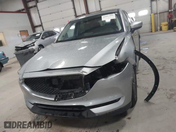 2020 Mazda CX-5 Touring with VIN JM3KFBCMXL0784653, listed as a IAAI auction lot 41817904 with 71,513 mi miles and . Bid and sale history available at carsss.com. Image 12.
