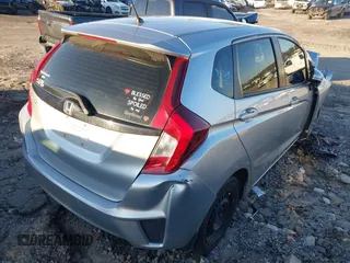 2016 Honda Fit LX with VIN JHMGK5H58GX003864, listed as a IAAI auction lot 41554364 with 258,819 mi miles. Bid and sale history available at carsss.com. Image 4.