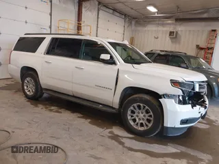 2015 Chevrolet Suburban LT with VIN 1GNSKJKCXFR659974, listed as a IAAI auction lot 42285943 with 153,274 mi miles and . Bid and sale history available at DreamBid. Image 1.