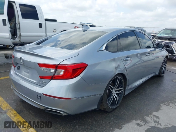 2020 Honda Accord Touring with VIN 1HGCV2F96LA018714, listed as a IAAI auction lot 42084295 with 74,861 mi miles and . Bid and sale history available at DreamBid. Image 4.