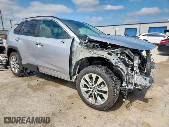 2021 Toyota RAV4 XLE Premium with VIN 2T3C1RFVXMC170581, listed as a Copart auction lot 58327005 with 54,200 mi miles and Salvage title. Bid and sale history available at DreamBid. Image 4.
