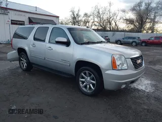 2013 GMC Yukon XL SLT z VIN 1GKS2KE73DR132065, wystawiony jako IAAI lot #40885853 z przebiegiem 207 492 mil mil oraz . Historia ofert i sprzedaży dostępna na DreamBid. Obrazek 1.