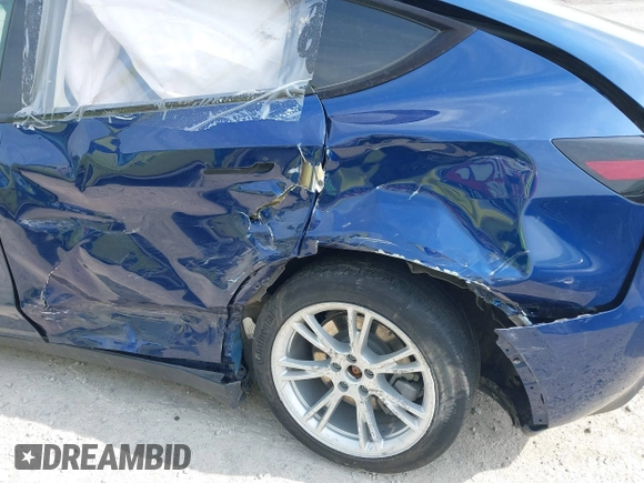 2022 Tesla Model Y Long Range z VIN 7SAYGDEE3NF455544, wystawiony jako IAAI lot #42123963 z przebiegiem 23 882 mil mil oraz . Historia ofert i sprzedaży dostępna na DreamBid. Obrazek 6.