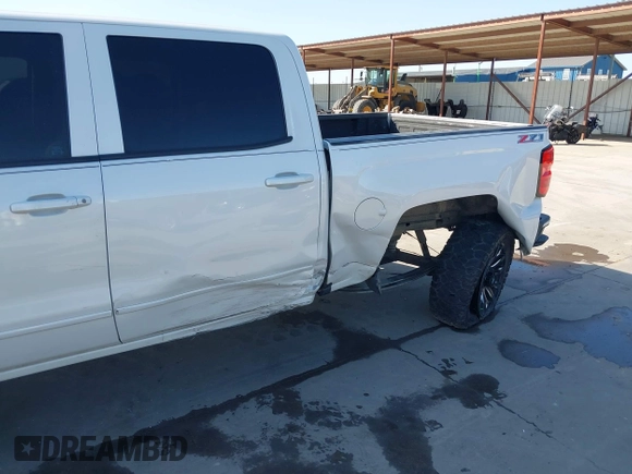 2016 Chevrolet Silverado 1500 LT with VIN 3GCUKREC8GG366278, listed as a IAAI auction lot 41993038 with 176,515 mi miles and . Bid and sale history available at DreamBid. Image 6.