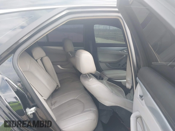 2011 Cadillac CTS with VIN 1G6DK8ED3B0140667, listed as a IAAI auction lot 41525505 with 145,837 mi miles and . Bid and sale history available at DreamBid. Image 8.