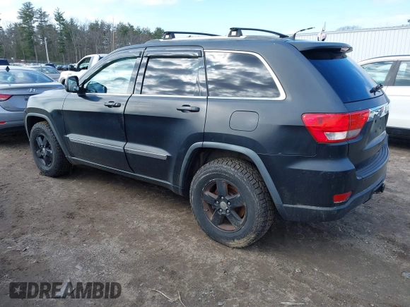 2011 Jeep Grand Cherokee Laredo with VIN 1J4RR4GG5BC670369, listed as a IAAI auction lot 41892892 with 164,807 mi miles and . Bid and sale history available at DreamBid. Image 3.