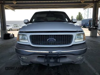 2002 Ford Expedition Eddie Bauer z VIN 1FMPU18L22LA23719, wystawiony jako Copart lot #57863995 z przebiegiem 148 641 mil mil oraz Szkoda całkowita • Salvage title. Historia ofert i sprzedaży dostępna na DreamBid. Obrazek 5.